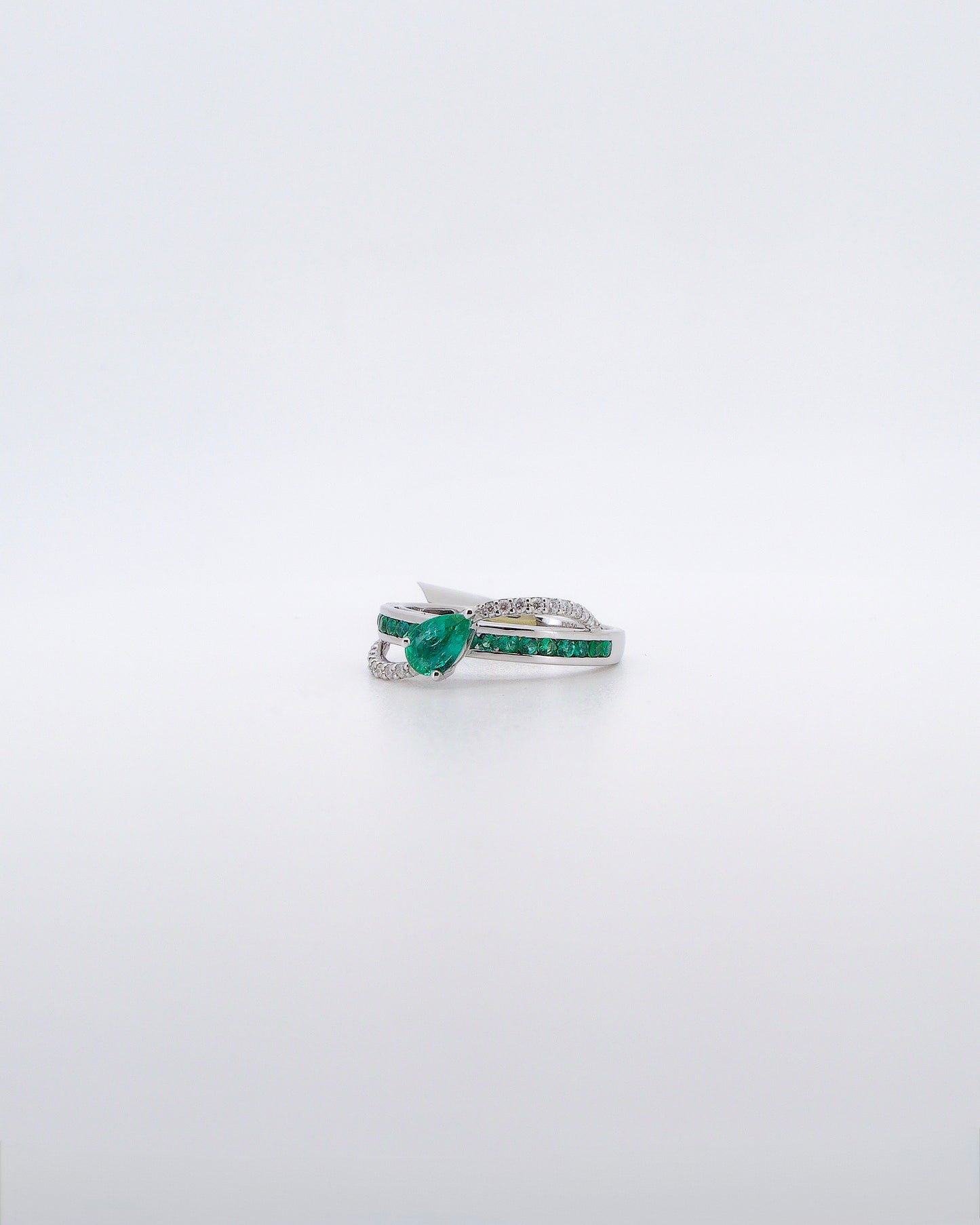 Bridged Emerald Ring