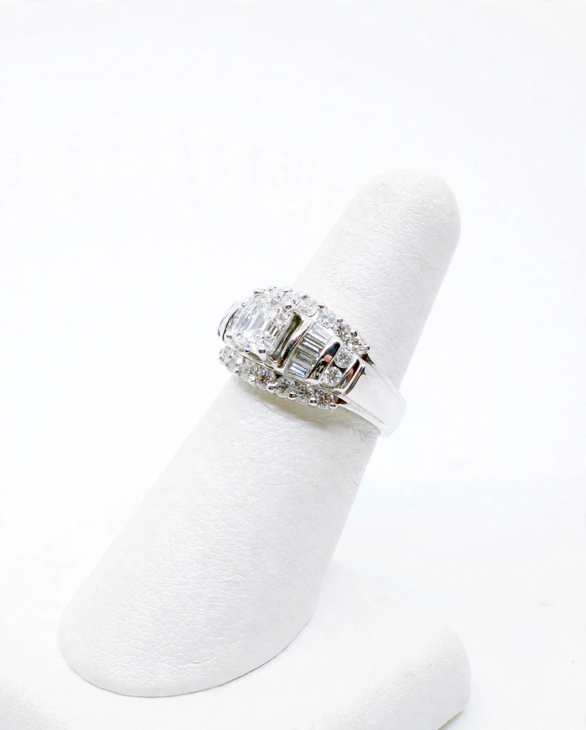 Emerald Cut Centre Diamond Ring