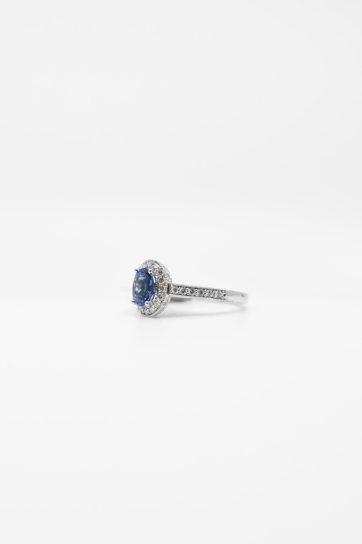 Classic Tanzanite & Diamond Halo Ring
