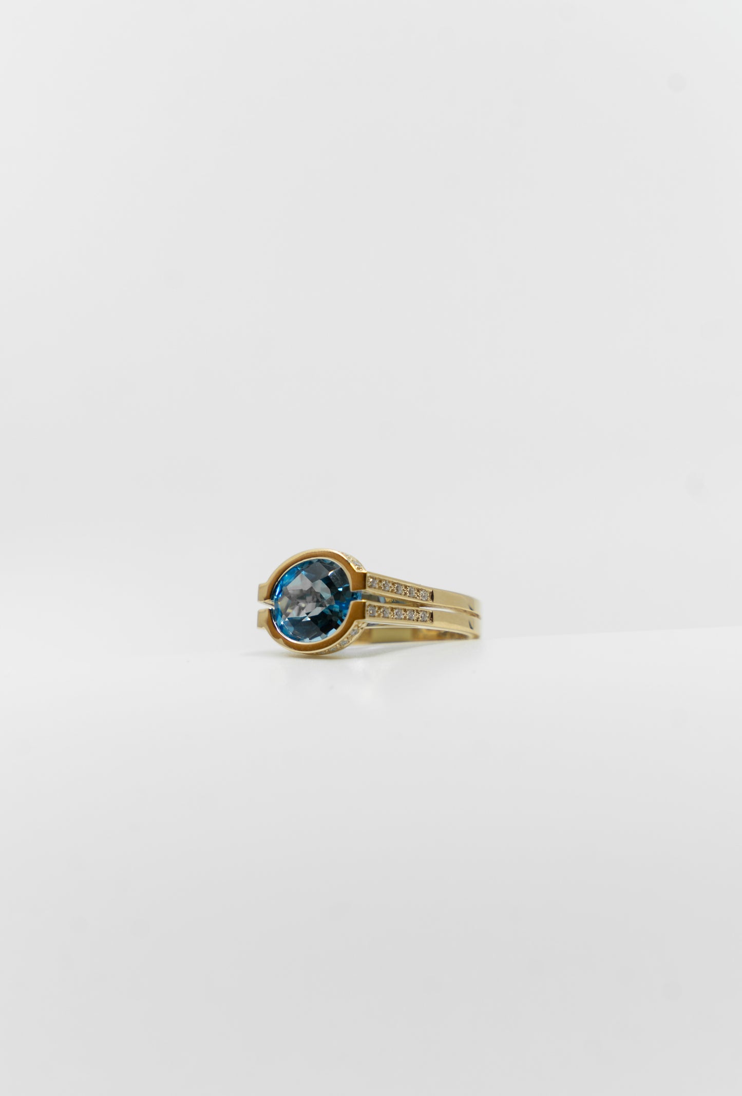 Open Bezel Blue Topaz Ring
