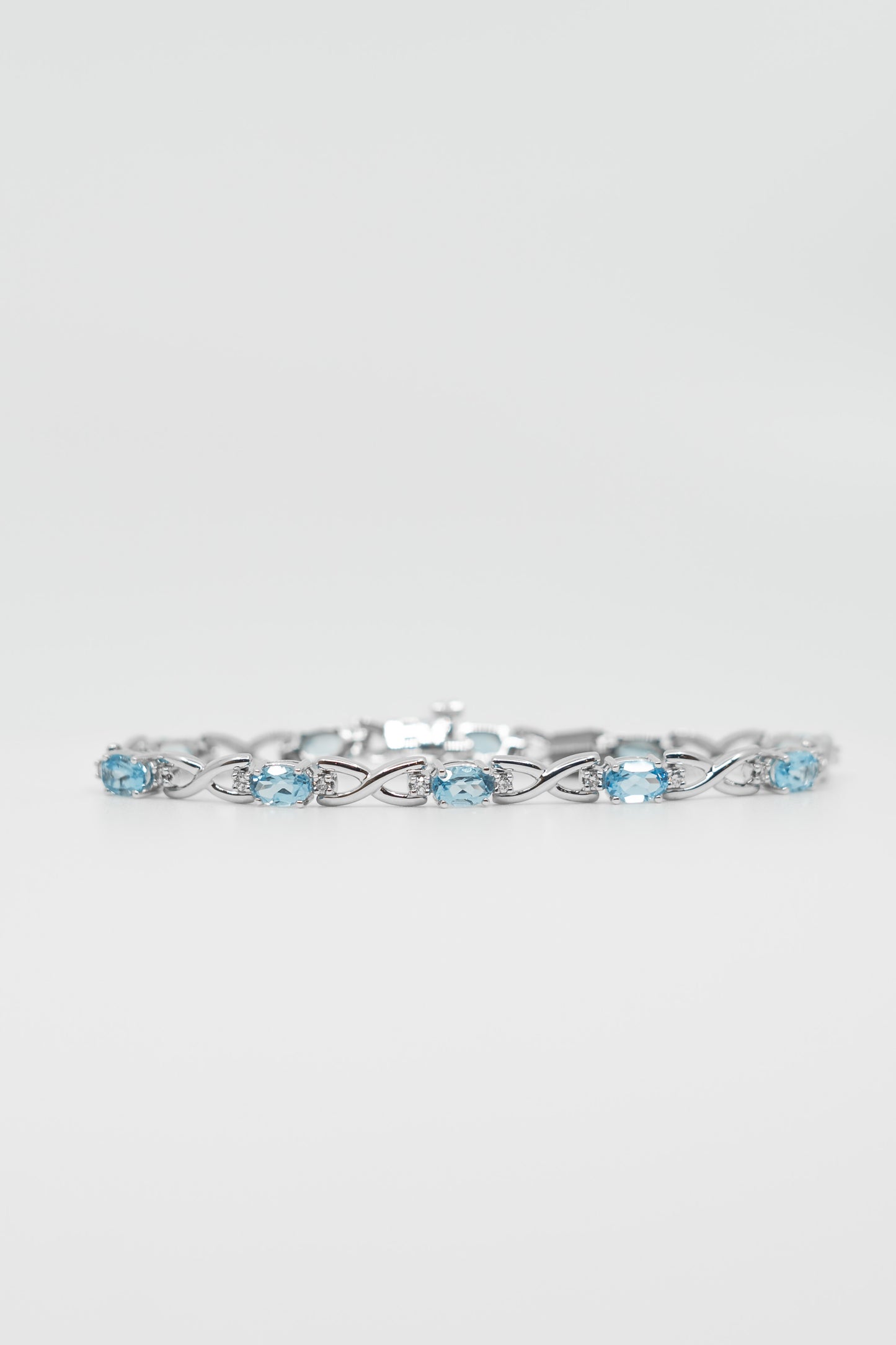 Blue Topaz & Diamond Twisted Link Bracelet