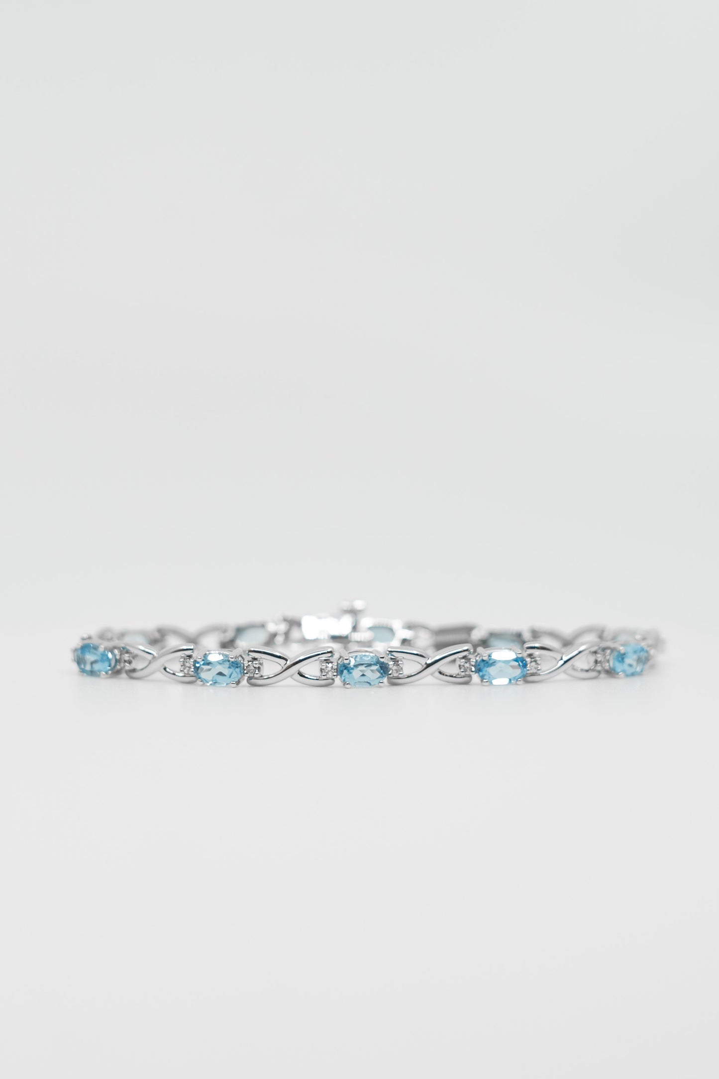 Blue Topaz & Diamond Twisted Link Bracelet