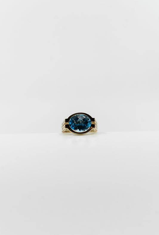 Open Bezel Blue Topaz Ring